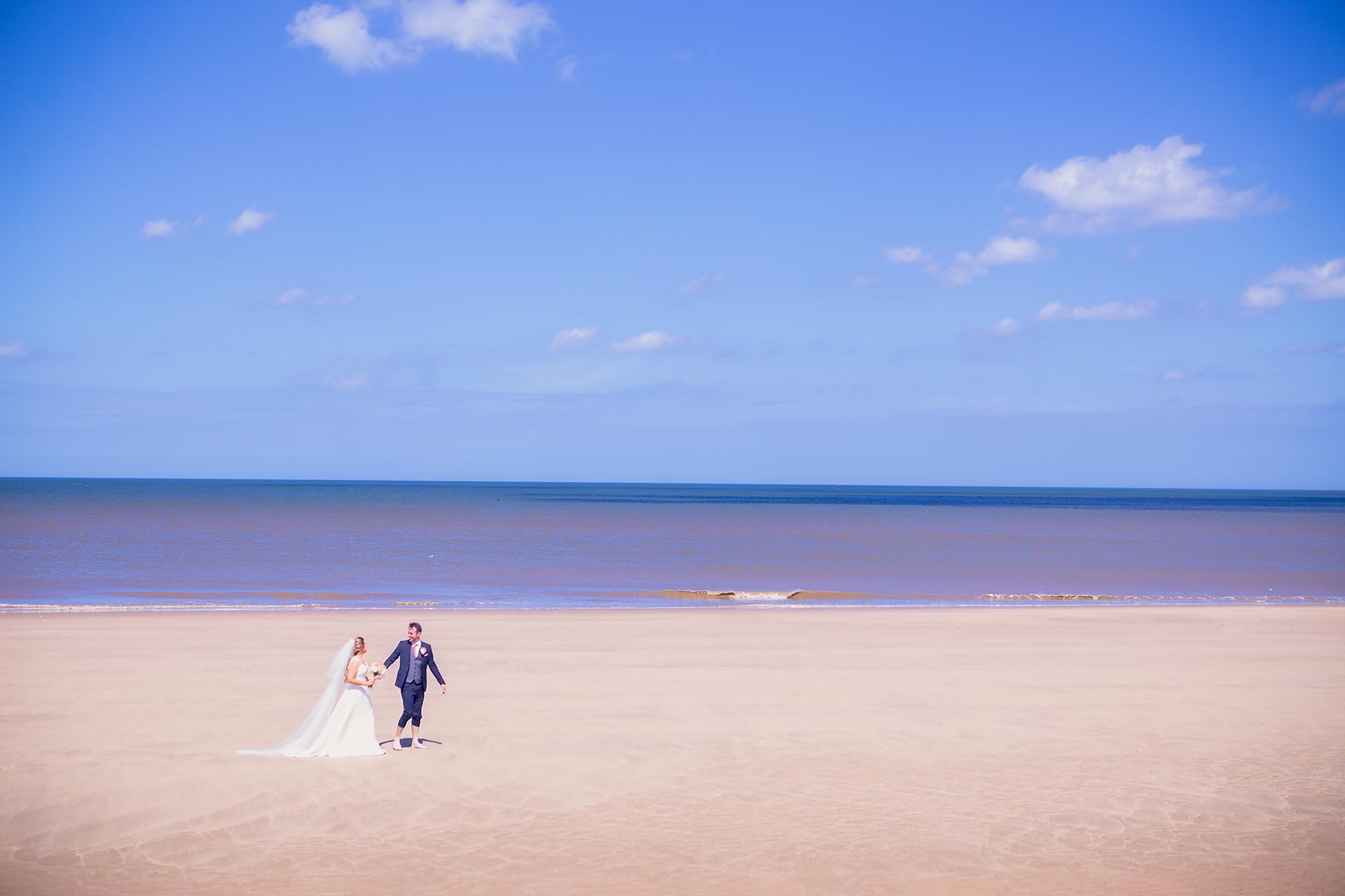 chaucer barn wedding photography - couple onthe beach